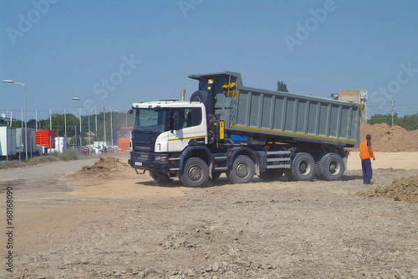Obraz Dump truck unloading soil