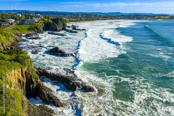 Fototapeta Drone aerial photograph of the rugged coastline in the Kiama suburb of Kiama Downs on the South Pacific Ocean coast in the Illawarra region on the south coast of New South Wales, Australia. 