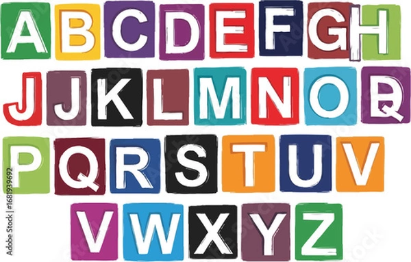 Fototapeta Alphabet blocks arranged in rows against a white background view