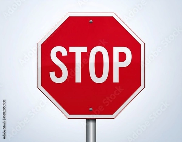 Fototapeta Octagonal red stop sign against light background