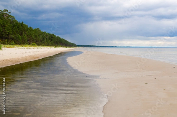 Fototapeta Baltic Sea Beach on Summer Day with Rain Clouds Panorama. Latvia, Gulf of Riga.