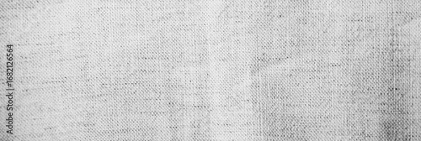 Fototapeta Black white light gray fabric cloth. Natural linen fabric texture background. Close-up. Empty. Design. Wide banner. Panoramic.