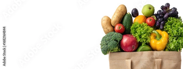 Obraz A paper bag filled with a variety of fresh produce