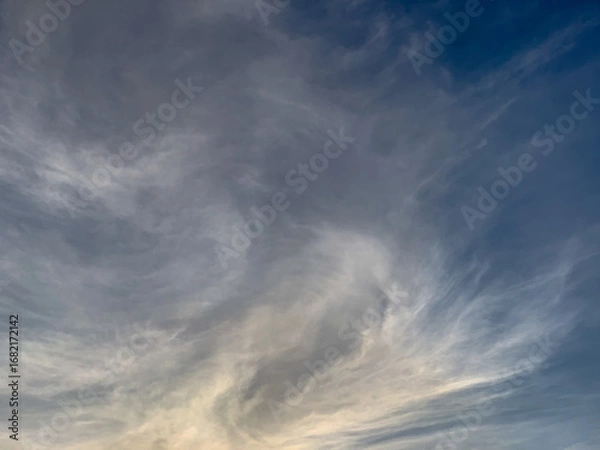 Fototapeta Cirrus clouds pattern on the blue sky.