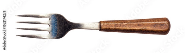 Fototapeta Vintage metal fork with wooden handle, showcasing rustic charm and simplicity