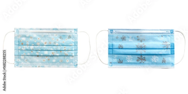 Obraz Two Blue Medical Masks with Snowflake and Decorative Pattern Against Transparent Background