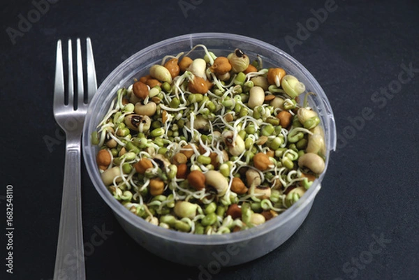 Fototapeta  sprouts of germinated seeds, grains, or legumes such as mung beans and chickpeas.