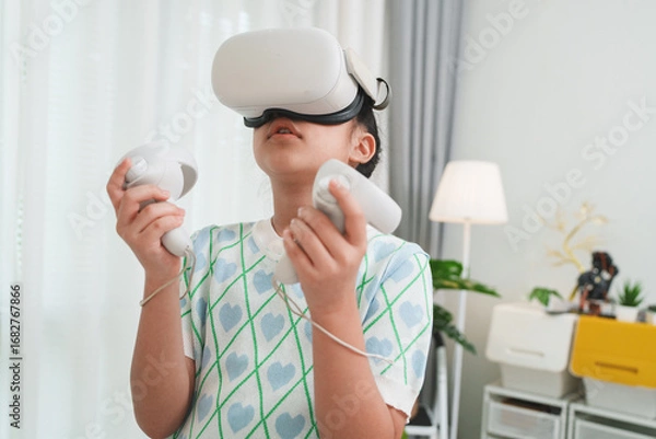 Fototapeta Girl exploring metaverse with VR goggles for virtual learning and simulation.