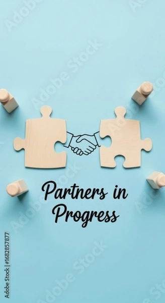 Fototapeta Two wooden puzzle pieces connected by a handshake graphic with text Partners in Progress partnership