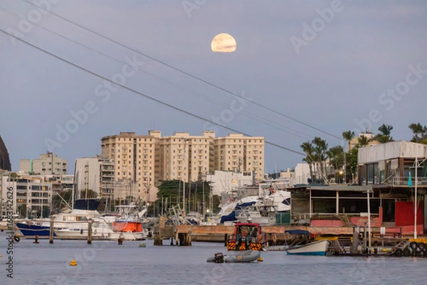 Fototapeta view of the moonrise in the urca neighborhood in rio de janeiro.