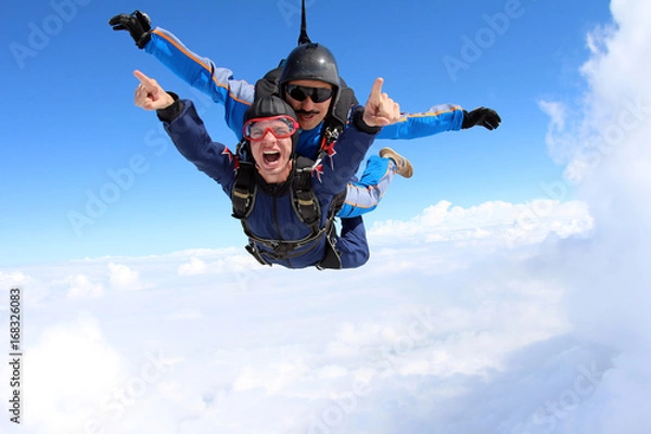 Obraz Skydiving. Tandem jump. Happy Passenger.