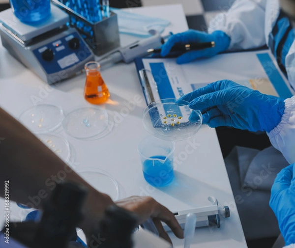 Fototapeta Collaboration, tablet or science with people in lab together for research or development. Innovation, tech and microscope with scientist team in clinical trial for planning or medical investigation