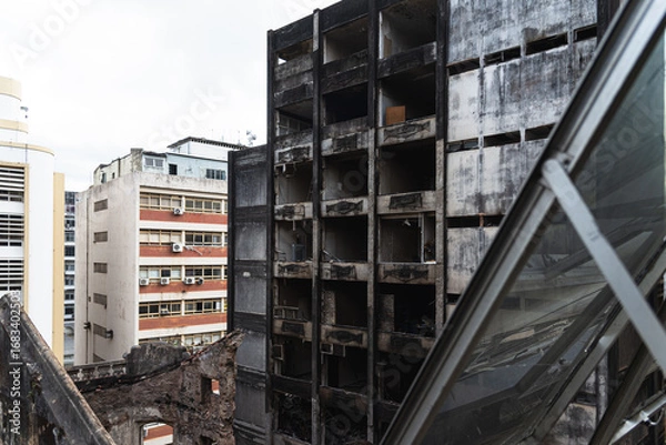 Fototapeta View of a building in ruins after a fire in the commercial district of the city of Salvador, Bahia.