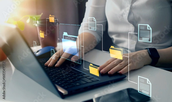 Fototapeta Businesswoman working on laptop with virtual screen. Process automation to efficiently manage files. Online documentation database and document management system concept.	
