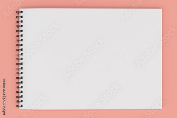 Fototapeta Blank white notebook with black spiral bound on red  background