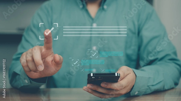 Fototapeta Businessman checking digital quality document control checklist and approving project with smartphone technology.