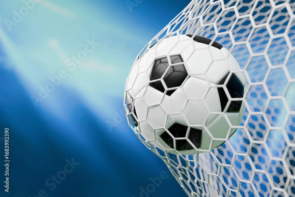 Fototapeta Soccer ball hitting the net in a stadium under bright lights, symbolizing goal, victory, and excitement of the game. Ideal for sports, competition, success, and teamwork themes