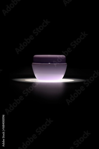 Fototapeta Elegant cosmetic jar with light reflection on black background