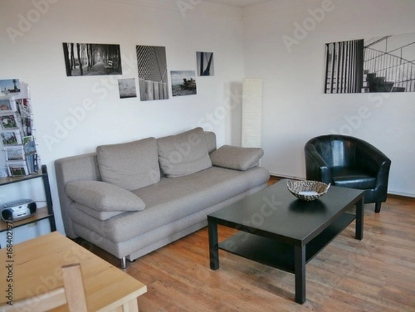 Fototapeta Wohnzimmer mit Möbeln in Wohnung