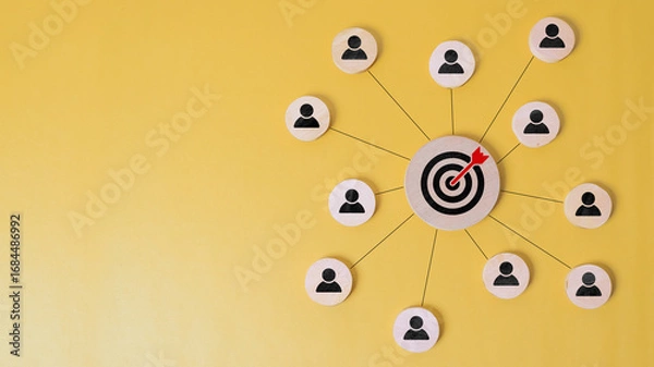 Fototapeta Customer relationship management concept. wooden block with target icon linked with human icons for customer focus group. Data exchanges development and customer service