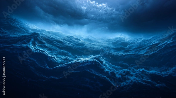 Fototapeta Deep blue ocean waves with glowing cracks beneath the surface, hinting at volcanic activity.
