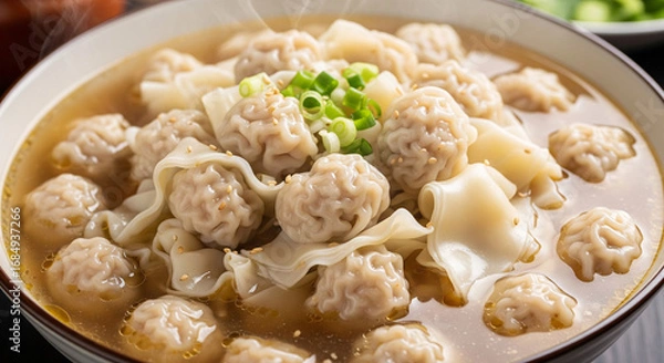 Fototapeta A bowl of wontons with a soup
