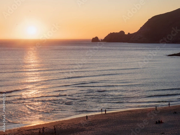 Fototapeta Finisterre Sunset in Galicia, Spain. Mar de Fora beach and Nave cape in Costa da Morte. This is the final step in the Camino de Santiago.