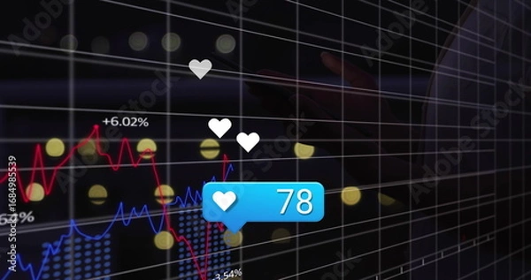 Fototapeta Displaying blue notification bubble showing 78 hearts over dark grid display with financial charts
