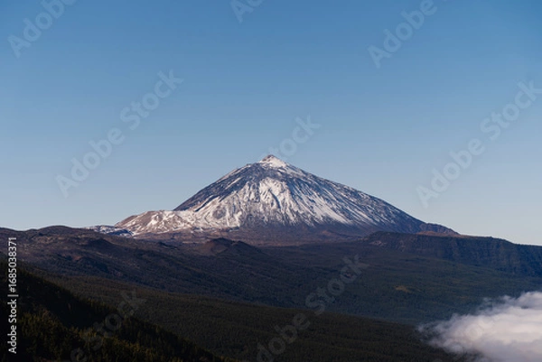 Fototapeta Wild Valley in El Teide National Park, Canary Islands, Tenerife, Spain. Snowcapped Teide volcano.