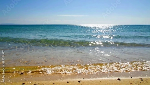 Fototapeta Serene coastal scene, gentle waves lapping shore