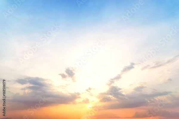 Obraz Sunset sky began to change from blue to orange.