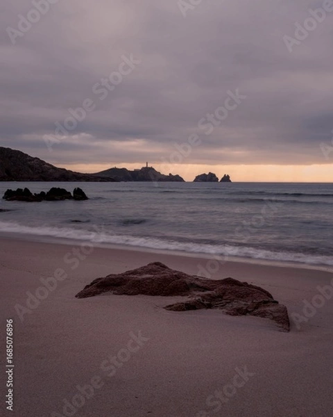 Fototapeta Cape Vilan Lighthouse and Reira beach in Camariñas, Galicia, Spain. First electrical lighthouse in Spain. This lighthouse was the first electrical lighthouse in Spain.