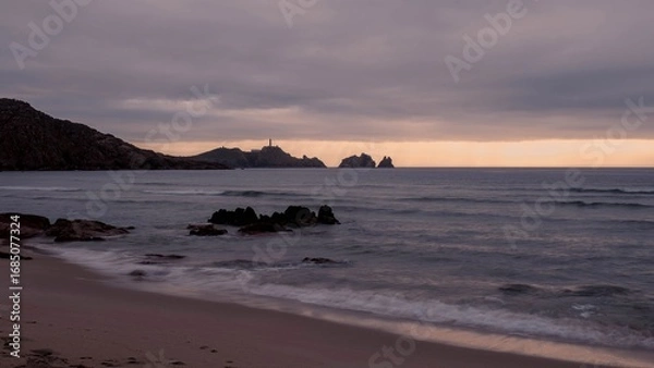 Fototapeta Cape Vilan Lighthouse and Reira beach in Camariñas, Galicia, Spain. First electrical lighthouse in Spain. This lighthouse was the first electrical lighthouse in Spain.