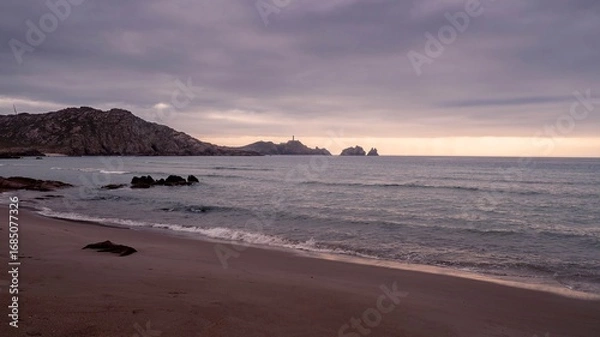 Fototapeta Cape Vilan Lighthouse and Reira beach in Camariñas, Galicia, Spain. First electrical lighthouse in Spain. This lighthouse was the first electrical lighthouse in Spain.