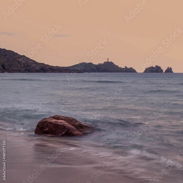 Fototapeta Cape Vilan Lighthouse and Reira beach in Camariñas, Galicia, Spain. First electrical lighthouse in Spain. This lighthouse was the first electrical lighthouse in Spain.
