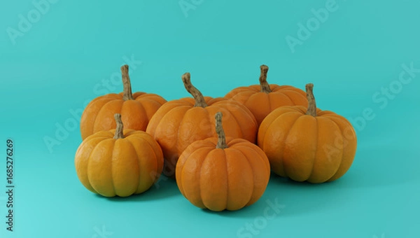 Fototapeta Pumpkins group isolated on light blue background.