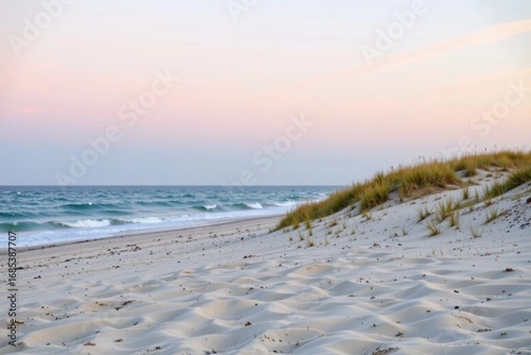 Fototapeta Serene Coastal Scene with Sandy Beach and Gentle Ocean Waves