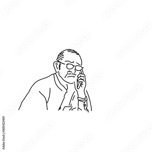 Fototapeta 困った顔で電話する男性