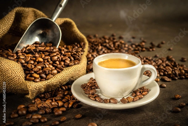 Fototapeta espresso with coffee beans burlap sack