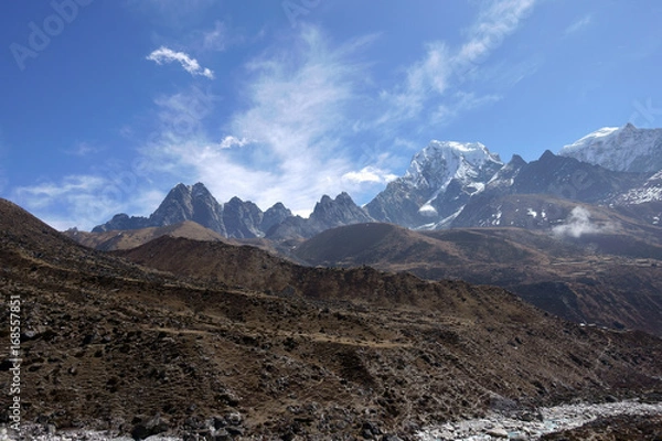 Fototapeta The mountain range on the background of clear sky