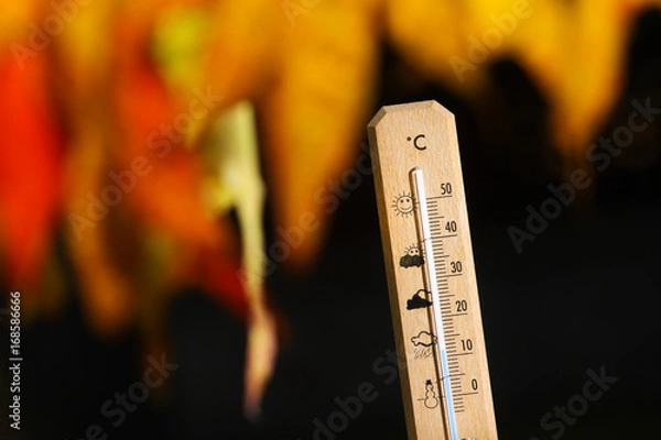 Fototapeta nice weather in the autumn shown with mercury thermometer