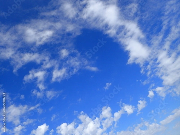 Fototapeta 青空の雲の背景、文字入れ可能