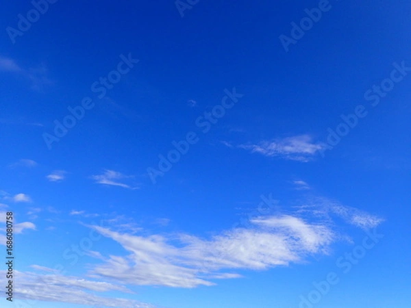 Fototapeta 青空の雲の背景、文字入れ可能