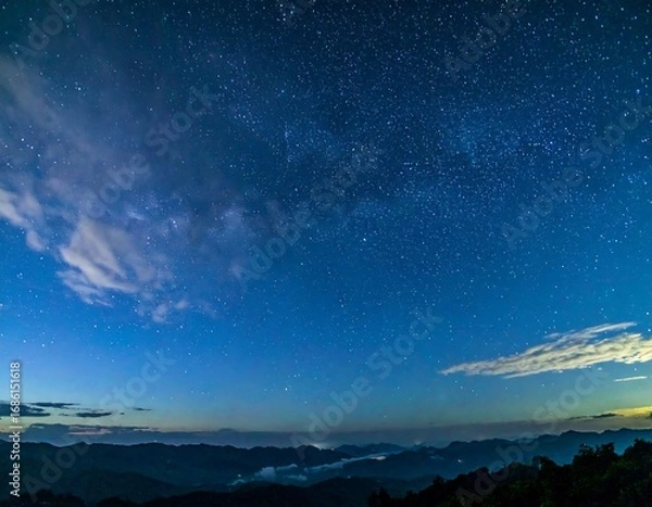 Fototapeta Starry night over mountain range