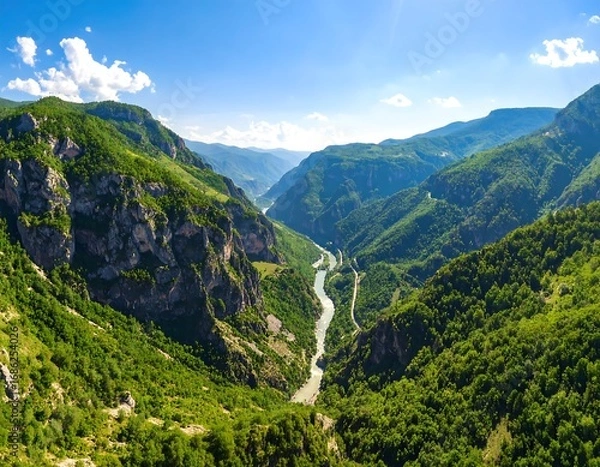 Obraz Mountainous river valley under a clear sky