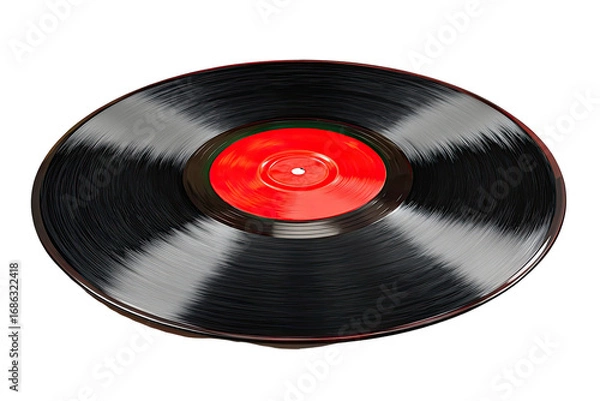 Fototapeta A black vinyl record, with a red label, rotates against a black background.  It shows the grooves and motion blur