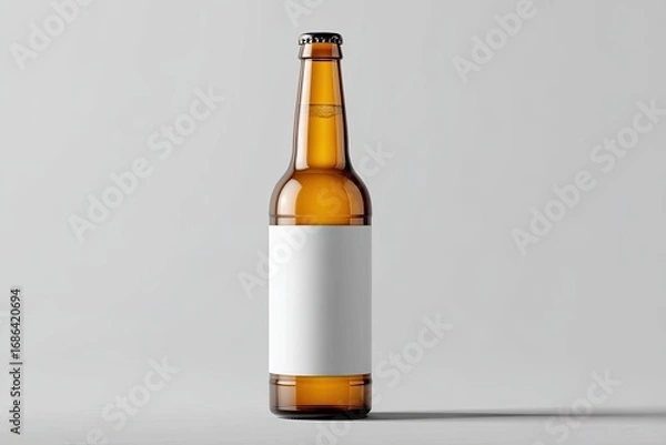 Fototapeta Amber beer bottle with blank label on plain background