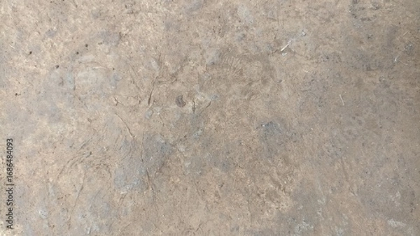 Fototapeta Cement Floor Background. Close-up of a Distressed Concrete Surface with Cracks and Stains for Vintage Designs