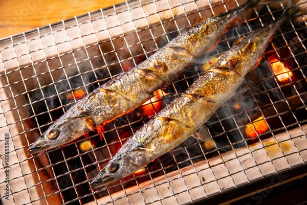 Fototapeta 秋刀魚を焼く 