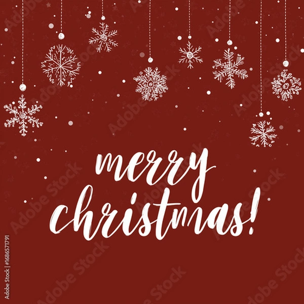 Fototapeta a red background with white snowflakes and hanging ornaments, featuring the word merry christmas